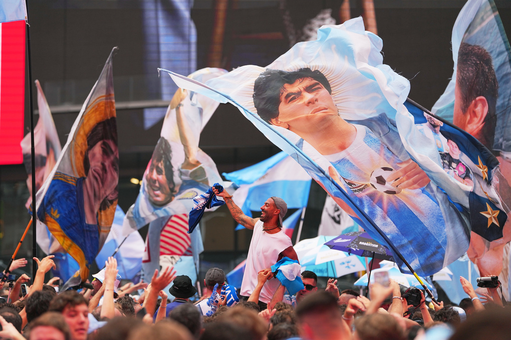 Argentina fans gather for a rally on the eve of the World Cup final soccer match in New York's Time Square, Saturday, July 18, 2026. (AP Photo/Julio Cortez)