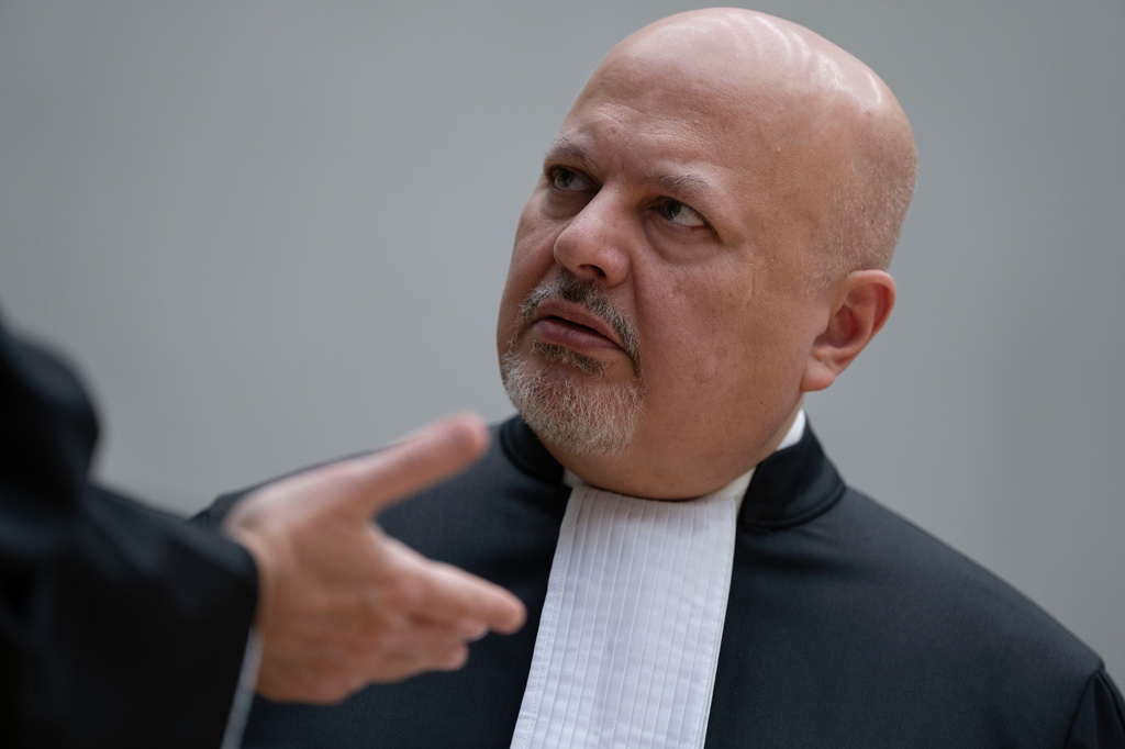FILE - Chief Prosecutor Karim Khan talks before convening the International Criminal Court (ICC) in The Hague, Netherlands, March 14, 2025. (AP Photo/Peter Dejong, Pool, File)