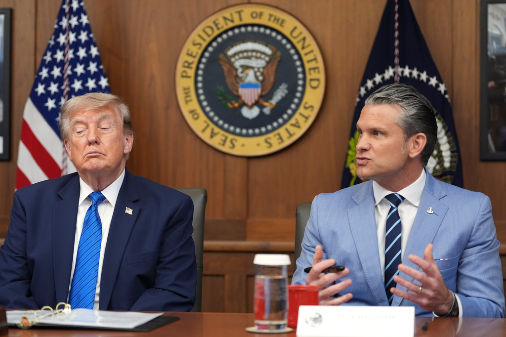 Defense Secretary Pete Hegseth speaks alongside President Donald Trump during a cabinet meeting, Friday, July 31, 2026, at Camp David, the presidential retreat, near Thurmont, Md., Friday, July 31, 2026. (AP Photo/Jacquelyn Martin)