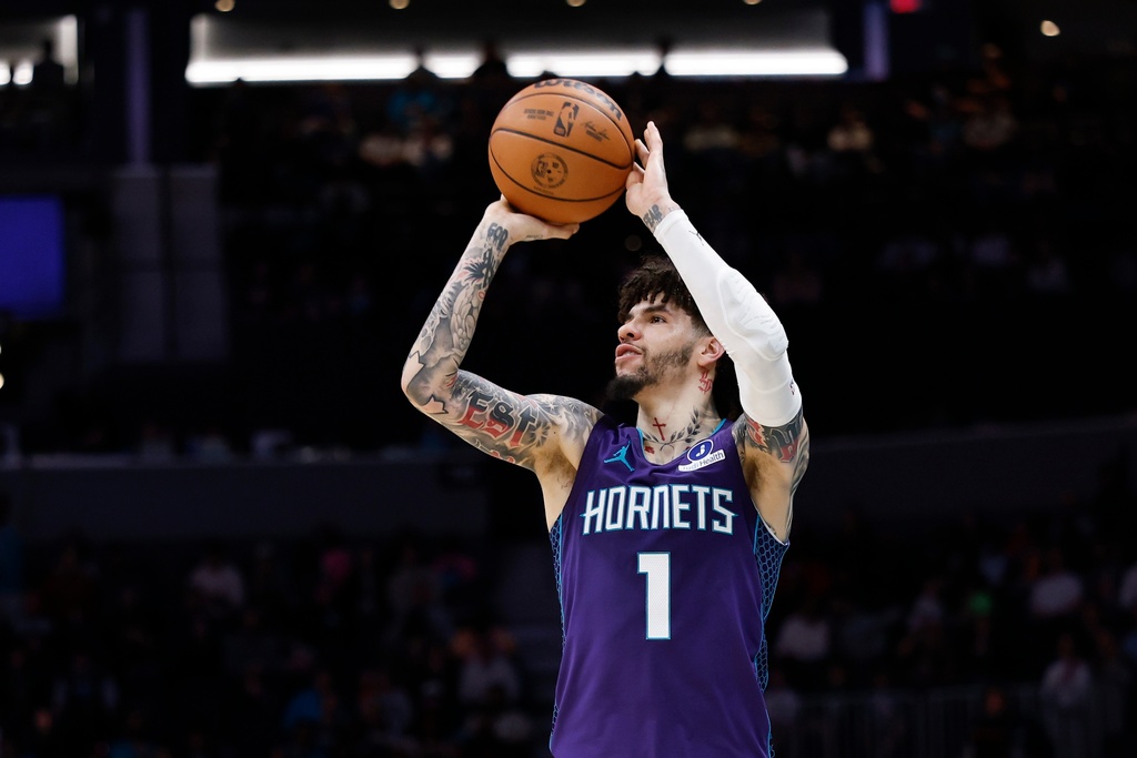 Charlotte Hornets guard LaMelo Ball shoots a jump shot against the Atlanta Hawks during the first half of an NBA basketball game in Charlotte, N.C., Wednesday, Feb. 11, 2026. (AP Photo/Nell Redmond)