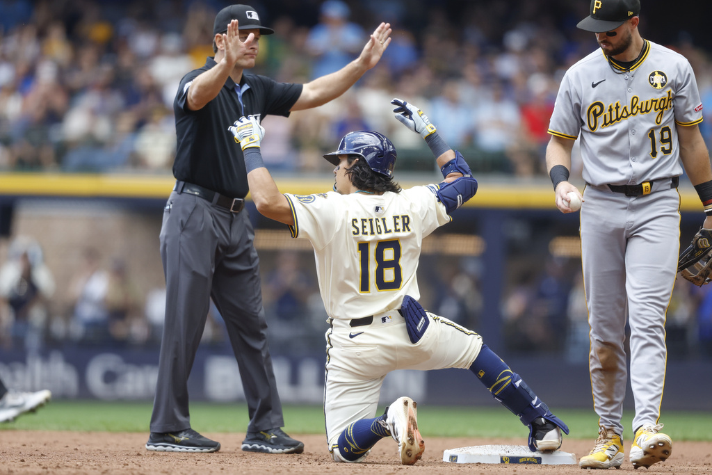 Milwaukee Brewers' Anthony Seigler reacts after his double against the Pittsburgh Pirates during the third inning of a baseball game, Wednesday, Aug. 13, 2025, in Milwaukee. (AP Photo/Jeffrey Phelps)