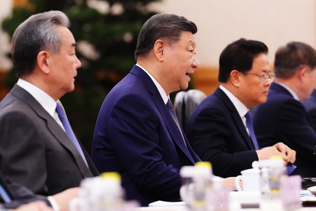 Chiese President Xi Jinping, center, meets with Canada's Prime Minister Mark Carney, unseen, at the Great Hall of the People in Beijing Friday, Jan. 16, 2026. (Sean Kilpatrick/The Canadian Press via AP)