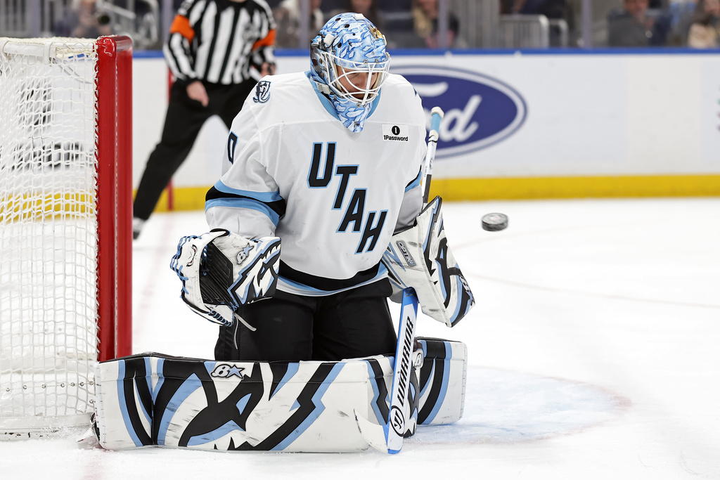 Utah Mammoth goaltender Karel Vejmelka makes a save in the second period of an NHL hockey game against the New York Islanders, Thursday, Jan. 1, 2026, in Elmont, N.Y. (AP Photo/Adam Hunger)