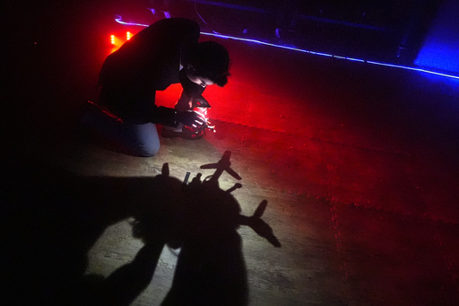 Colin Balfour, a sophomore studying robotics engineering, checks the rotors on a small drone at a laboratory at the Worcester Polytechnic Institute, Monday, Oct. 20, 2025, in Worcester, Mass. (AP Photo/Charles Krupa) Colin Balfour, a sophomore studying robotics engineering, checks the rotors on a small drone at a laboratory at the Worcester Polytechnic Institute, Monday, Oct. 20, 2025, in Worcester, Mass. (AP Photo/Charles Krupa)