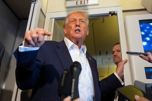 President Donald Trump speaks to reporters aboard Air Force One while traveling from Kuala Lumpur, Malaysia, to Tokyo, Japan, Monday, Oct. 27, 2025. (AP Photo/Mark Schiefelbein) President Donald Trump speaks to reporters aboard Air Force One while traveling from Kuala Lumpur, Malaysia, to Tokyo, Japan, Monday, Oct. 27, 2025. (AP Photo/Mark Schiefelbein)