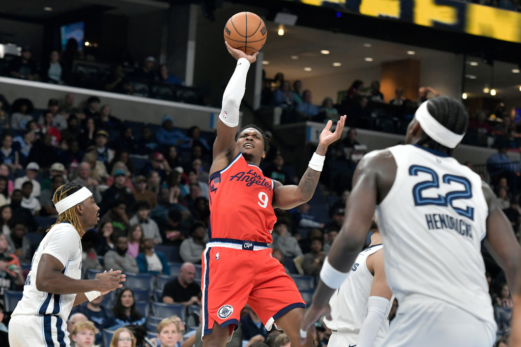 Los Angeles Clippers guard Bennedict Mathurin (9) shoots against the Memphis Grizzlies in the first half of an NBA basketball game Saturday, March 7, 2026, in Memphis, Tenn. (AP Photo/Brandon Dill)