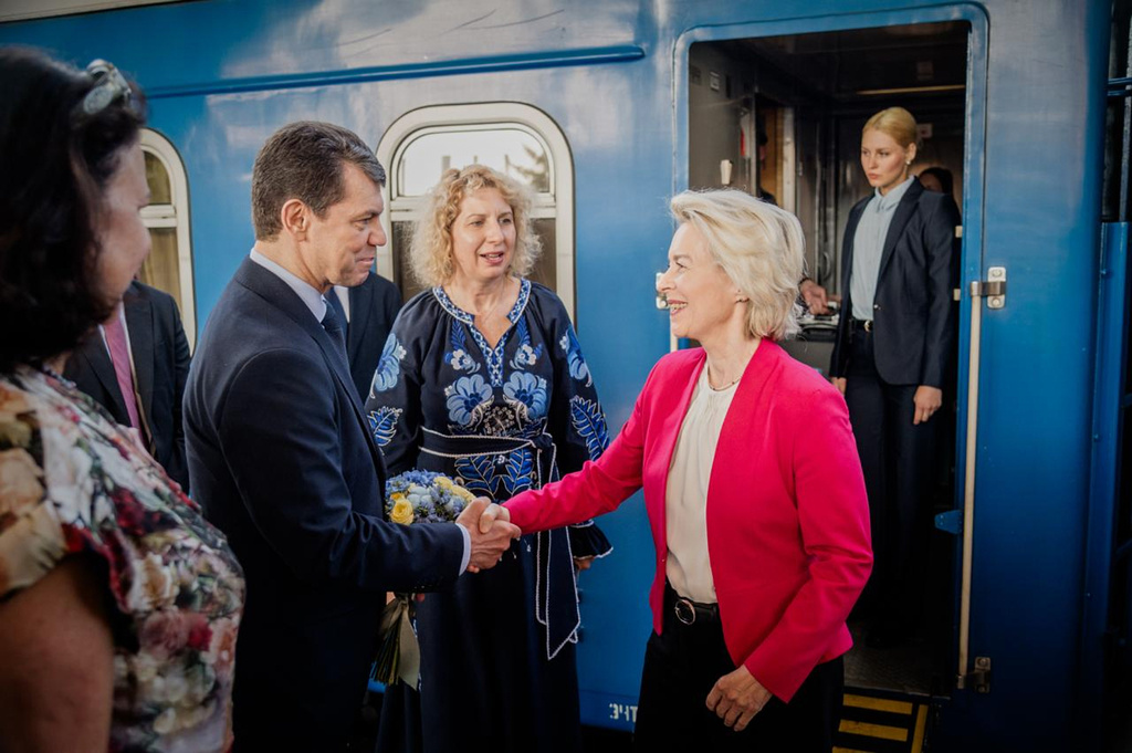 In this photo provided by the Ukrainian Foreign Ministry Press Office, Ukraine's deputy of Foreign Minister Olexander Mischenko, left, welcomes European Commission President Ursula von der Leyen upon her arrival at a railway station in Kyiv, Ukraine, Wednesday, July 15, 2026. (Ukrainian Foreign Ministry Press Office via AP)