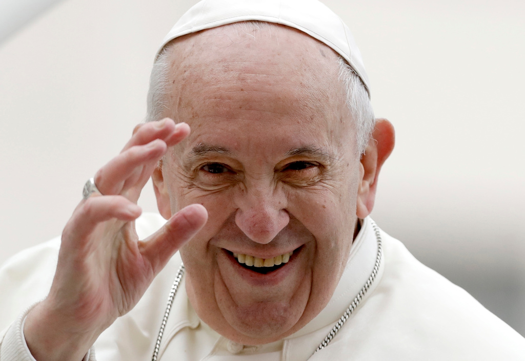 FILE - Pope Francis leaves at the end of his weekly general audience in St. Peter's Square, at the Vatican, May 15, 2019. (AP Photo/Andrew Medichini, File)