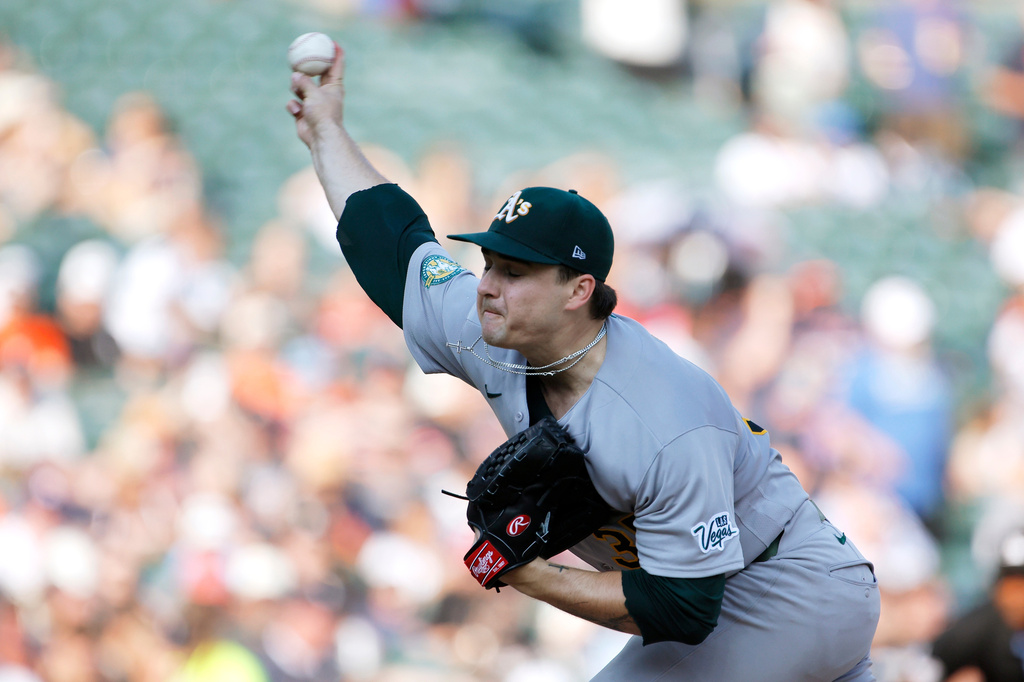 Athletics' J.T. Ginn pitches against the Detroit Tigers during the first inning of a baseball game Tuesday, July 7, 2026, in Detroit. (AP Photo/Duane Burleson)