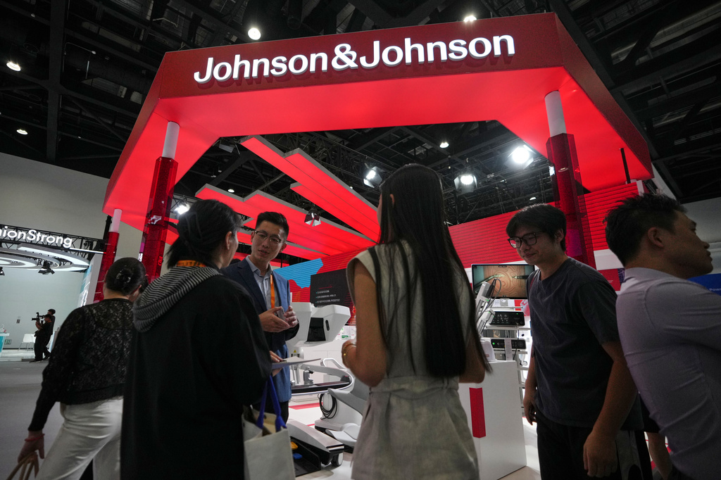 Visitors tour a Johnson & Johnson's booth promoting medical machines at the medical service sector for China International Fair for Trade in Services (CIFTIS) at the Shougang venue in Beijing, Wednesday, Sept. 9, 2026. (AP Photo/Andy Wong)