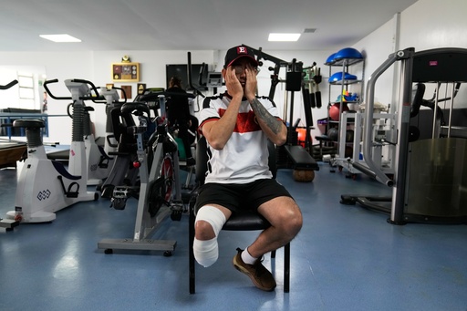 Soldier Luis Miguel Lopez, who was wounded by a land mine and who was comforted by emotional support dogs, attends therapy at the military hospital in Bogota, Colombia, Thursday, Oct. 2, 2025. (AP Photo/Fernando Vergara) Soldier Luis Miguel Lopez, who was wounded by a land mine and who was comforted by emotional support dogs, attends therapy at the military hospital in Bogota, Colombia, Thursday, Oct. 2, 2025. (AP Photo/Fernando Vergara)