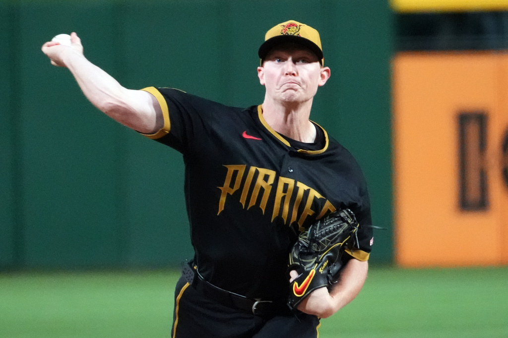 Pittsburgh Pirates pitcher Mitch Keller delivers against the Cincinnati Reds in the first inning of a baseball game in Pittsburgh, Friday, May 1, 2026. (AP Photo/Tom E. Puskar)
