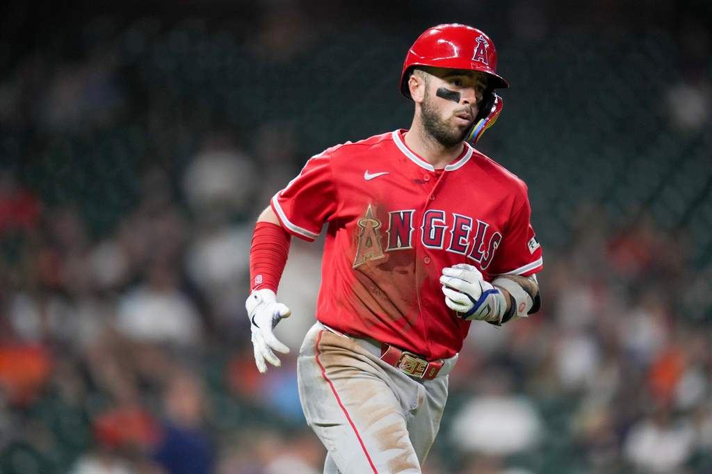 Los Angeles Angels' Zach Neto rounds the bases after hitting a three-run home run against the Houston Astros during the fifth inning of a baseball game Thursday, Aug. 20, 2026, in Houston. (AP Photo/Eric Christian Smith)