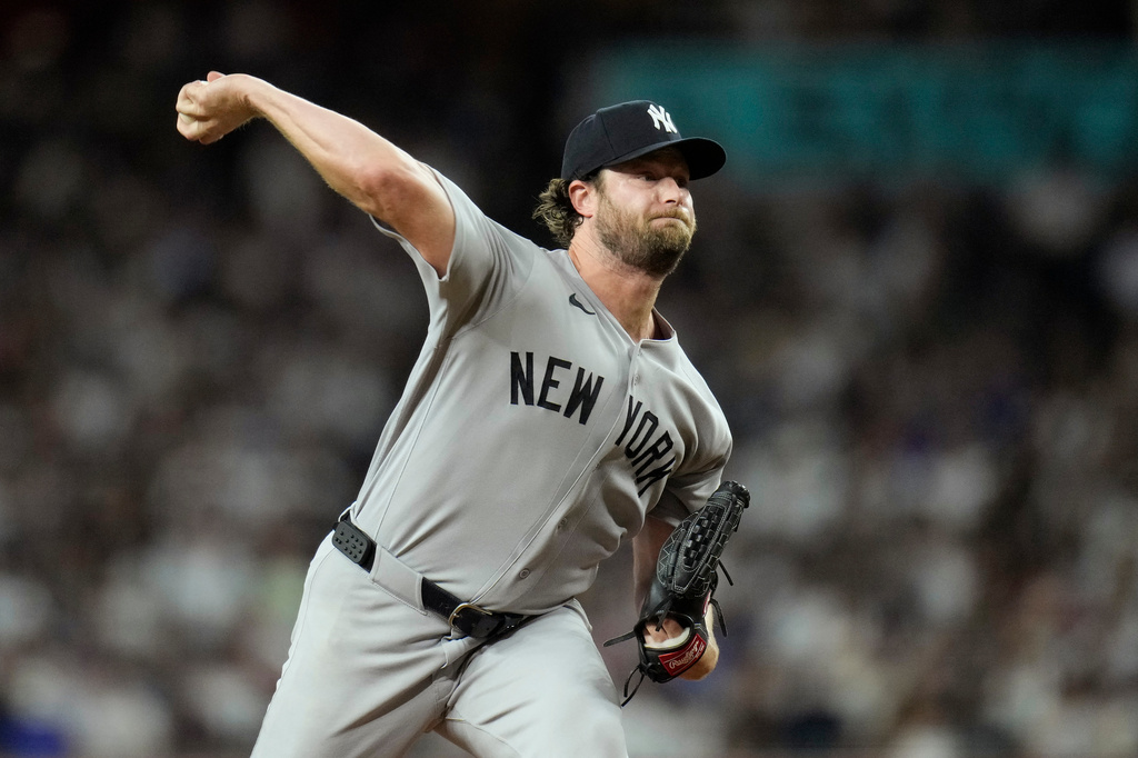 New York Yankees starting pitcher Gerrit Cole throws against the Arizona Diamondbacks during the first inning of a baseball game, Friday, Sept. 18, 2026, in Phoenix. (AP Photo/Ross D. Franklin)
