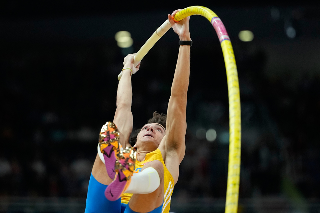Armand Duplantis, of Sweden, makes an attempt in the men's pole vault final at the World Athletics Indoor Championships in Torun, Poland, Saturday, March 21, 2026. (AP Photo/Matthias Schrader)
