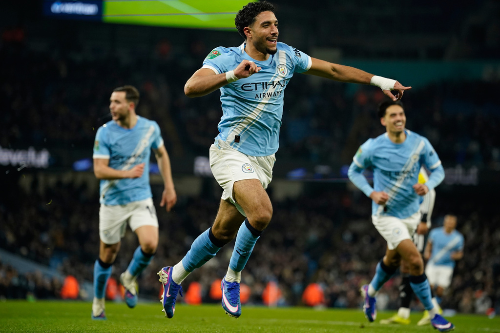 Manchester City's Omar Marmoush celebrates after scoring during the English League Cup semifinal soccer match soccer match between Manchester City and Newcastle in Manchester, England, Wednesday, Feb. 4, 2026. (AP Photo/Dave Thompson)