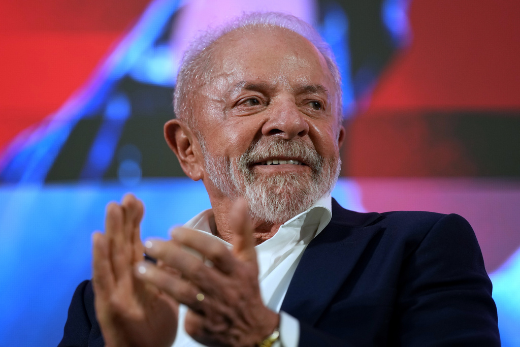 Brazilian President Luiz Inacio Lula da Silva applauds during a ceremony announcing outgoing Finance Minister Fernando Haddad's candidacy for governor of Sao Paulo state in the October elections, in Sao Bernardo do Campo, Brazil, Thursday, March 19, 2026. (AP Photo/Andre Penner)