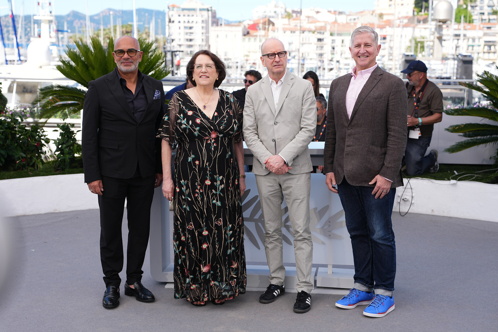 David Hudson, from left, Nancy Saslow, director Steven Soderbergh and David Hillman pose for photographers at the photo call for the film 'John Lennon: The Last Interview' during the 79th international film festival, Cannes, southern France, Saturday, May 16, 2026. (Photo by Scott A Garfitt/Invision/AP)