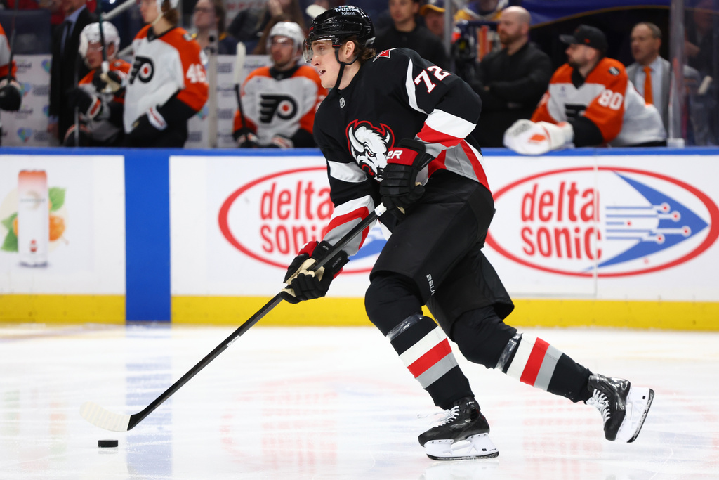 Buffalo Sabres center Tage Thompson carries the puck up ice during the second period of an NHL hockey game against the Philadelphia Flyers, Thursday, Dec. 18, 2025, in Buffalo, N.Y. (AP Photo/Jeffrey T. Barnes)