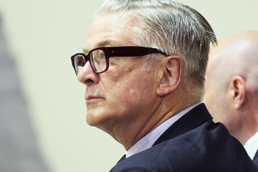 FILE - Actor Alec Baldwin attends his trial on involuntary manslaughter for the 2021 fatal shooting of cinematographer Halyna Hutchins during filming of the Western movie "Rust," July 12, 2024, at Santa Fe County District Court in Santa Fe, N.M. (Ramsay de Give/Pool Photo via AP, File) FILE - Actor Alec Baldwin attends his trial on involuntary manslaughter for the 2021 fatal shooting of cinematographer Halyna Hutchins during filming of the Western movie "Rust," July 12, 2024, at Santa Fe County District Court in Santa Fe, N.M. (Ramsay de Give/Pool Photo via AP, File)