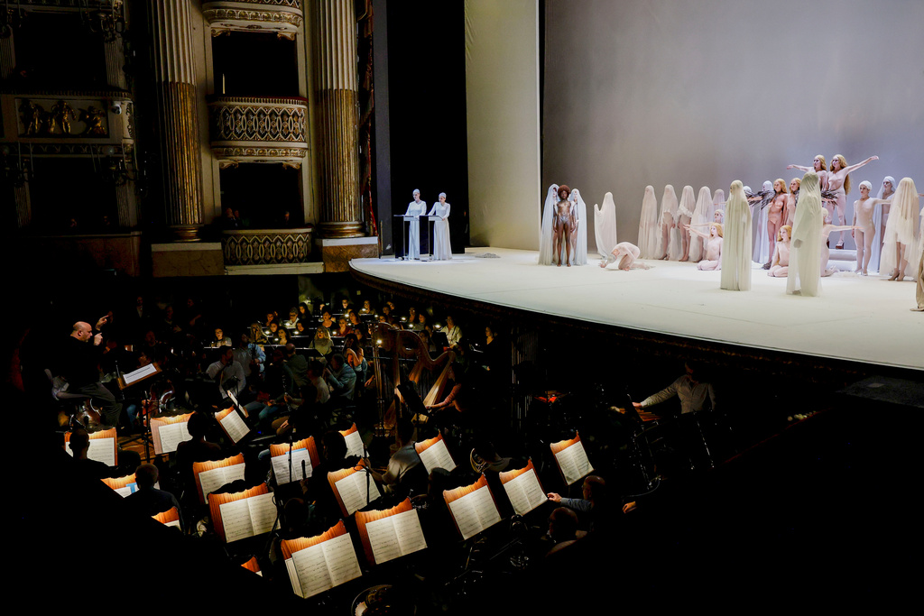 Actors perform during the general rehearsal of Ennio Morricone's only opera, Partenope, at the San Carlo Theatre, in Naples, Italy, Thursday, Dec. 11, 2025. (AP Photo/Salvatore Laporta)