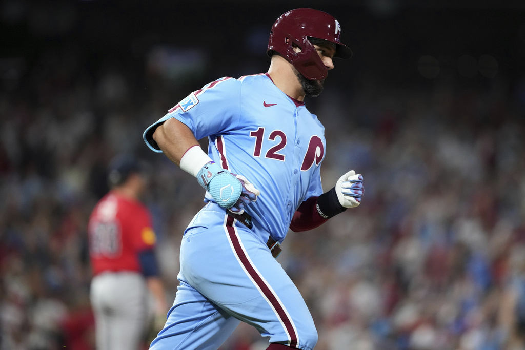 Philadelphia Phillies' Kyle Schwarber rounds the bases after hitting a three-run home run against Atlanta Braves pitcher Austin Cox during the fifth inning of a baseball game Thursday, Aug. 28, 2025, in Philadelphia. (AP Photo/Matt Slocum)