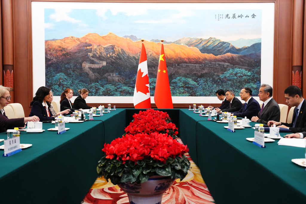 Canada's Foreign Minister Anita Anand, second left, meets with Chinese Foreign Minister Wang Yi, second right, at the Great Hall of the People in Beijing, China Thursday, Jan. 15, 2026. (Sean Kilpatrick/The Canadian Press via AP)
