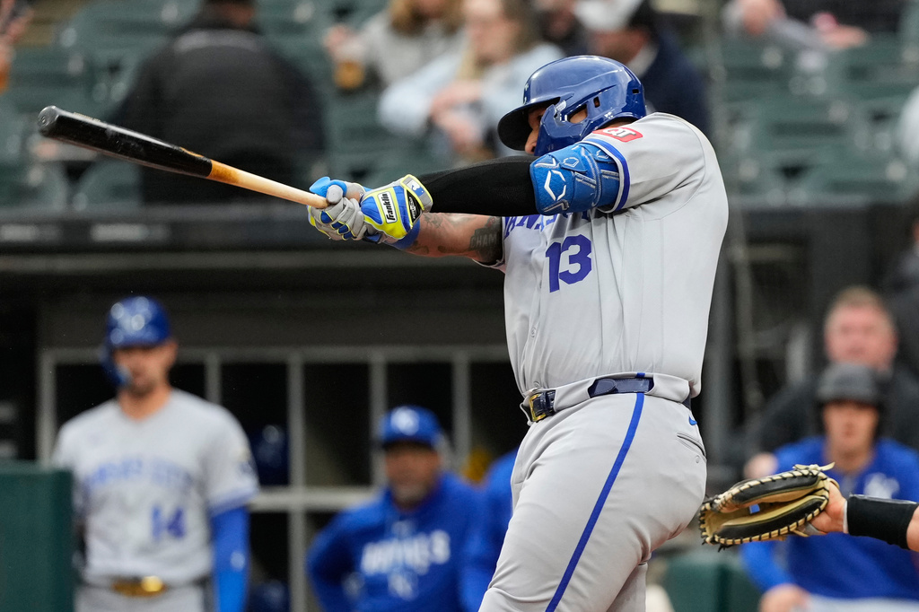 Kansas City Royals' Salvador Perez hits a solo home run during the first inning of a baseball game against the Chicago White Sox in Chicago, Tuesday, May 12, 2026. (AP Photo/Nam Y. Huh)