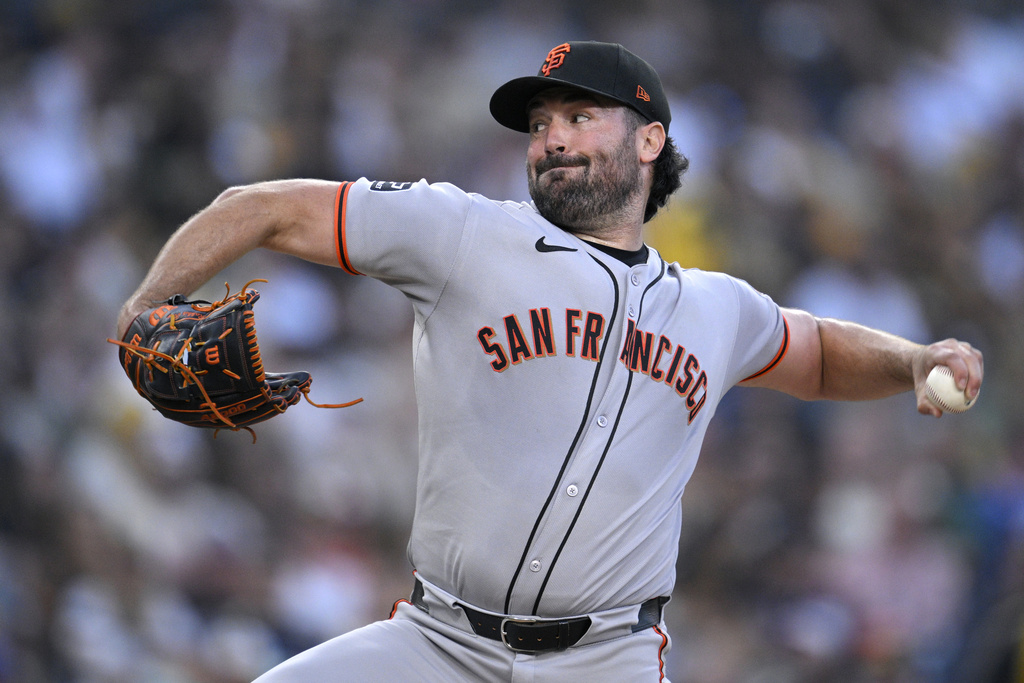 San Francisco Giants starting pitcher Robbie Ray works against a San Diego Padres batter during the first inning of a baseball game Monday, Aug 18, 2025, in San Diego. (AP Photo/Orlando Ramirez)