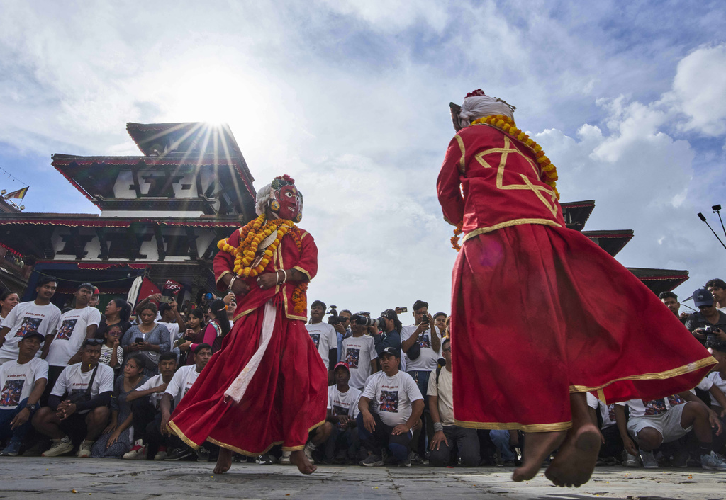 Masked dancers perform during Indra Jatra, a festival that marks the end of the rainy season in Kathmandu, Nepal, Saturday, Sept. 6, 2025. (AP Photo/Niranjan Shrestha)