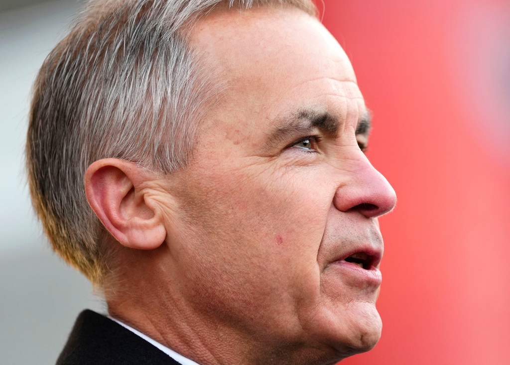 FILE - Canada Prime Minister Mark Carney speaks at City Hall in Ottawa, Ontario, on Sunday, Dec. 14, 2025. (Justin Tang/The Canadian Press via AP,File)