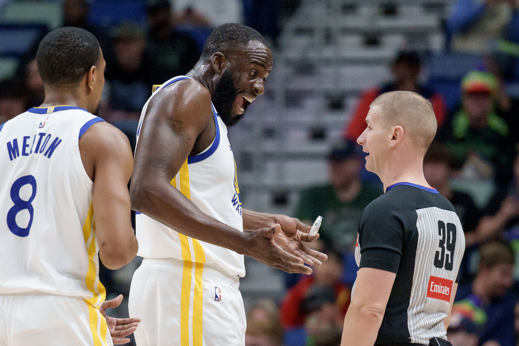 Golden State Warriors forward Draymond Green (23) argues a call during the first half of an NBA basketball game against the New Orleans Pelicans in New Orleans, Tuesday, Feb. 24, 2026. (AP Photo/Matthew Hinton)