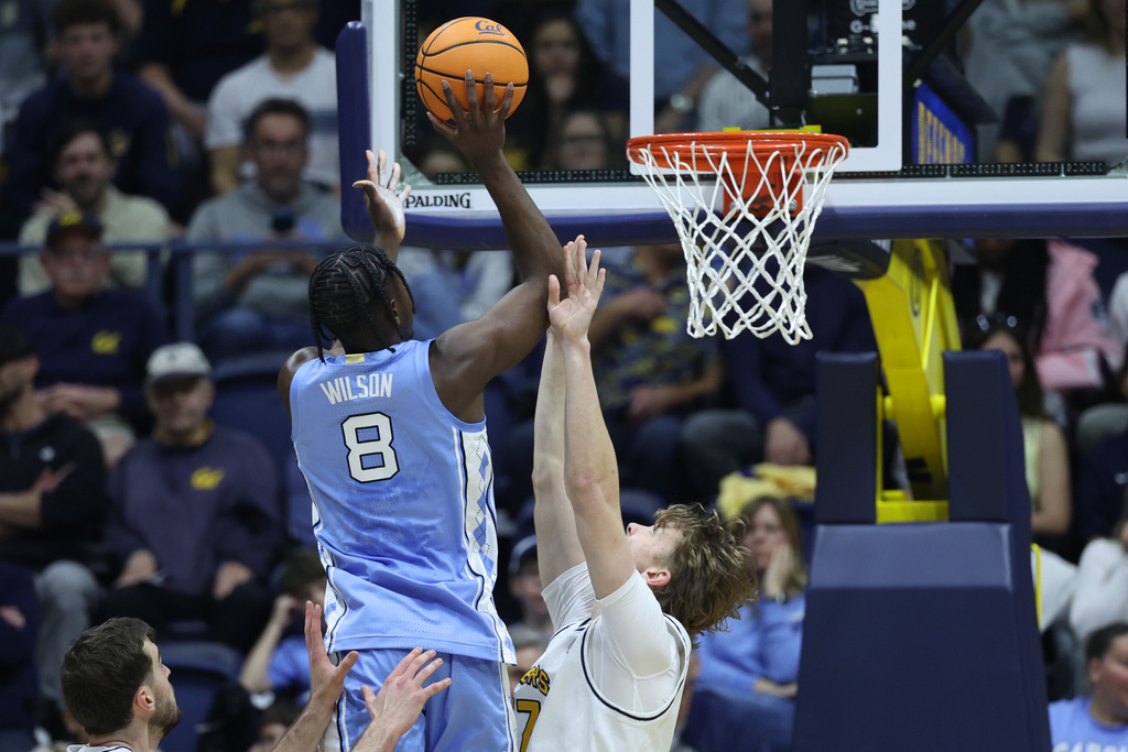 North Carolina forward Caleb Wilson (8) shoots against California center Mantas Kocanas, right, during the first half of an NCAA college basketball game in Berkeley, Calif., Saturday, Jan. 17, 2026. (AP Photo/Jed Jacobsohn)