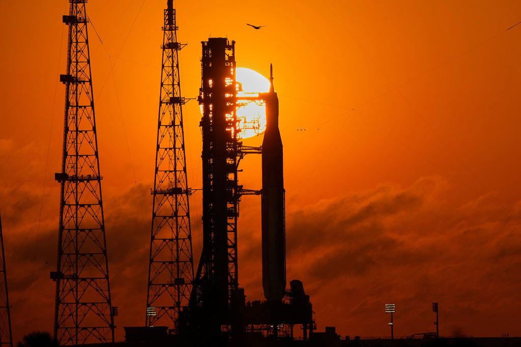 NASA's Space Launch System rocket with the Orion spacecraft set for the Artemis 2 mission is seen on Launch Complex 39B at sunrise at the Kennedy Space Center, Tuesday, March 24, 2026, in Cape Canaveral, Fla. (AP Photo/John Raoux)