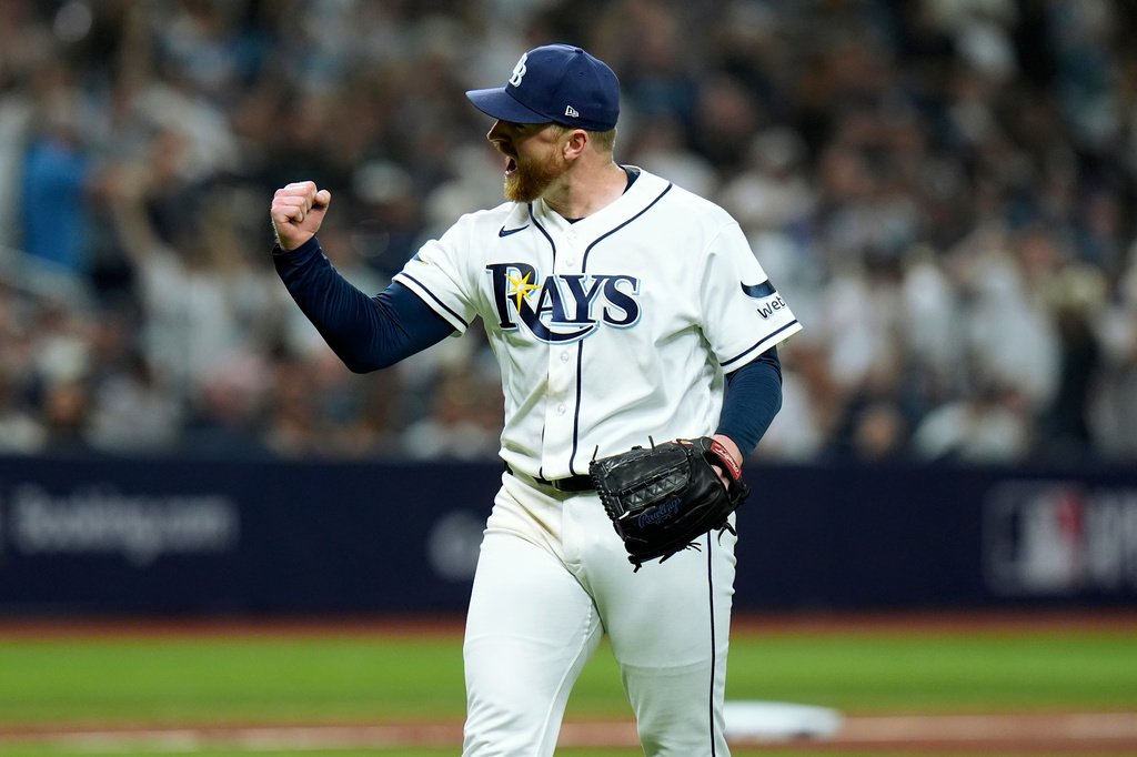 Tampa Bay Rays pitcher Drew Rasmussen celebrates after striking out New York Yankees' Cody Bellinger to end the top of the sixth inning of Game 1 of an American League Division Series baseball game Saturday, Oct. 3, 2026, in St. Petersburg, Fla. (AP Photo/Chris O'Meara)