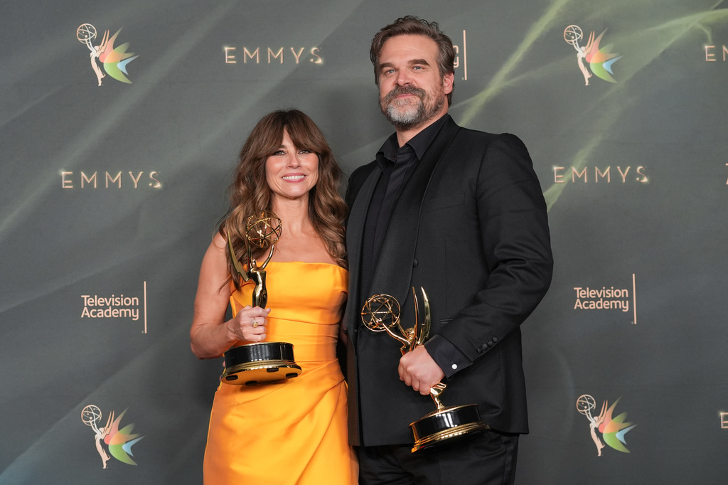 Linda Cardellini, left, and David Harbour pose in the press room with the awards for outstanding supporting actress in a limited or anthology series or movie and outstanding supporting actor in a limited or anthology series or movie for "DTF St. Louis" during night two of the Creative Arts Emmy Awards on Sunday, Sept. 6, 2026, in Los Angeles. (AP Photo/Chris Pizzello)