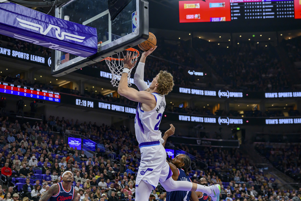 Utah Jazz forward Lauri Markkanen (23) lays the ball into the basket during the first half of an NBA basketball game against the Los Angeles Clippers, Wednesday, Oct. 22, 2025, in Salt Lake City. (AP Photo/Tyler Tate)
