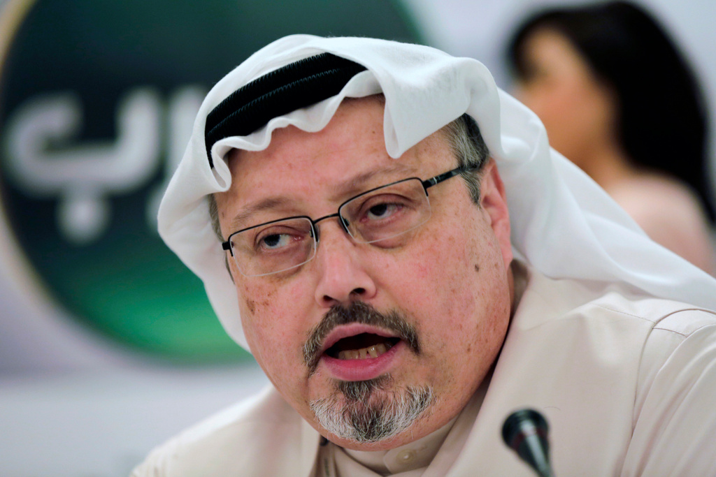 FILE - Saudi journalist Jamal Khashoggi speaks during a press conference in Manama, Bahrain on Dec. 15, 2014. (AP Photo/Hasan Jamali, File)