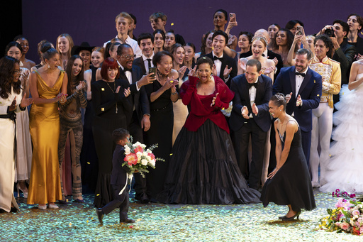 Dancer Misty Copeland, right, takes a bow during curtain calls with her son, Jackson, at her retirement performance from American Ballet Theatre at the David H. Koch Theater at Lincoln Center, Wednesday, Oct. 22, 2025, in New York. (Rosalie O'Connor via AP) Dancer Misty Copeland, right, takes a bow during curtain calls with her son, Jackson, at her retirement performance from American Ballet Theatre at the David H. Koch Theater at Lincoln Center, Wednesday, Oct. 22, 2025, in New York. (Rosalie O'Connor via AP)
