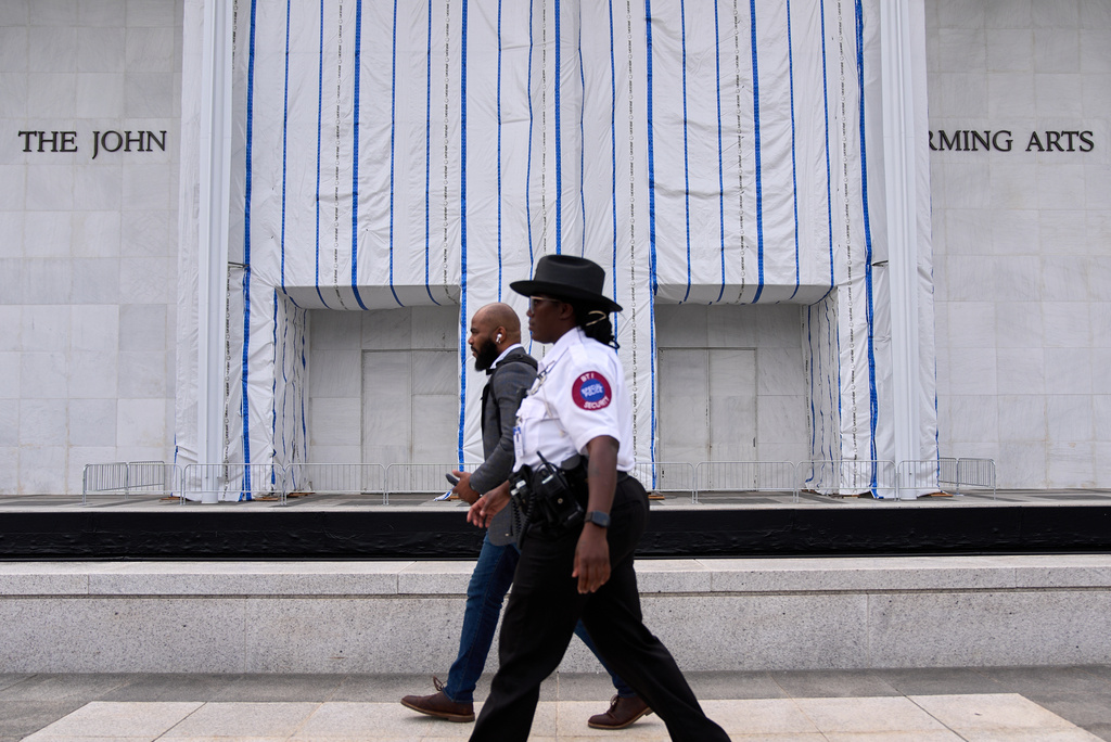 Security patrols the Kennedy Center, which has been fenced off and closed to the public, Thursday, Sept. 17, 2026, in Washington. (AP Photo/Jacquelyn Martin)