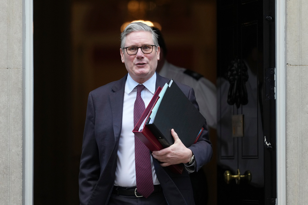 Britain's Prime Minister Keir Starmer departs 10 Downing Street to go to the House of Commons for his weekly Prime Minister's Questions in London, Wednesday, Feb. 4, 2026. (AP Photo/Alastair Grant)