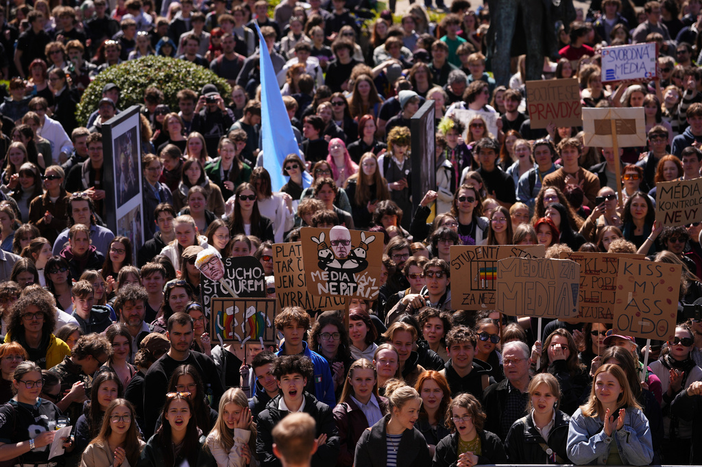 Thousands of students attend a demonstration in support of public media in Prague, Czech Republic, Wednesday, April 22, 2026. (AP Photo/Petr David Josek)