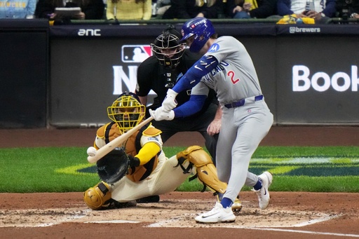 Chicago Cubs' Nico Hoerner hits a single during the third inning of Game 5 of baseball's National League Division Series against the Milwaukee Brewers Saturday, Oct. 11, 2025, in Milwaukee. (AP Photo/Morry Gash) Chicago Cubs' Nico Hoerner hits a single during the third inning of Game 5 of baseball's National League Division Series against the Milwaukee Brewers Saturday, Oct. 11, 2025, in Milwaukee. (AP Photo/Morry Gash)