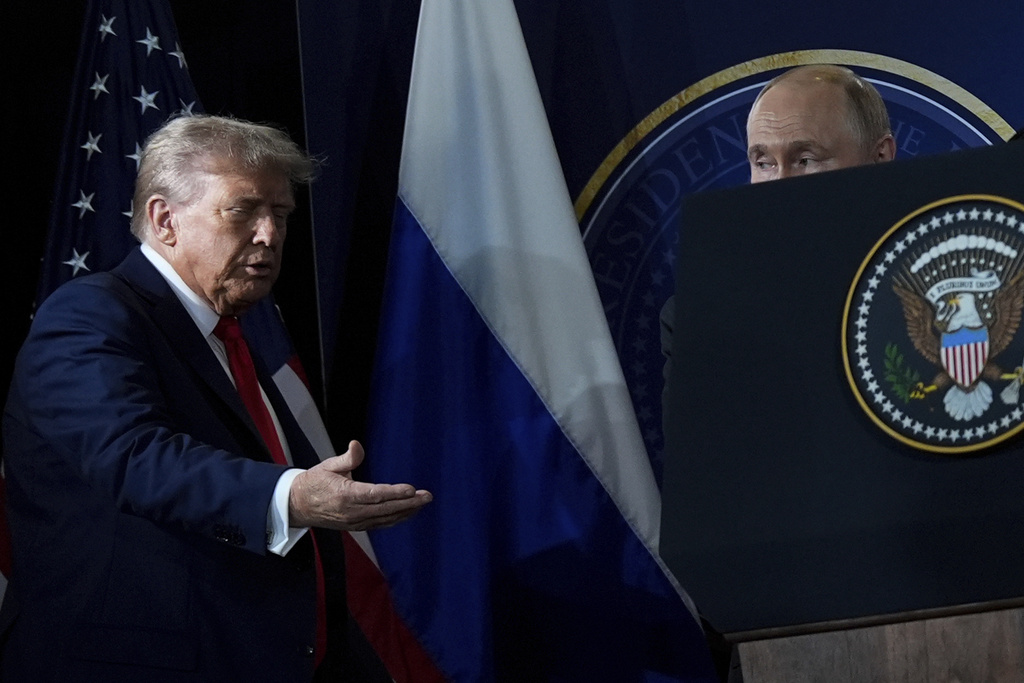President Donald Trump and Russia's President Vladimir Putin arrive for a press conference at Joint Base Elmendorf- Richardson, Friday, Aug. 15, 2025, in Anchorage, Alaska. (AP Photo/Julia Demaree Nikhinson)