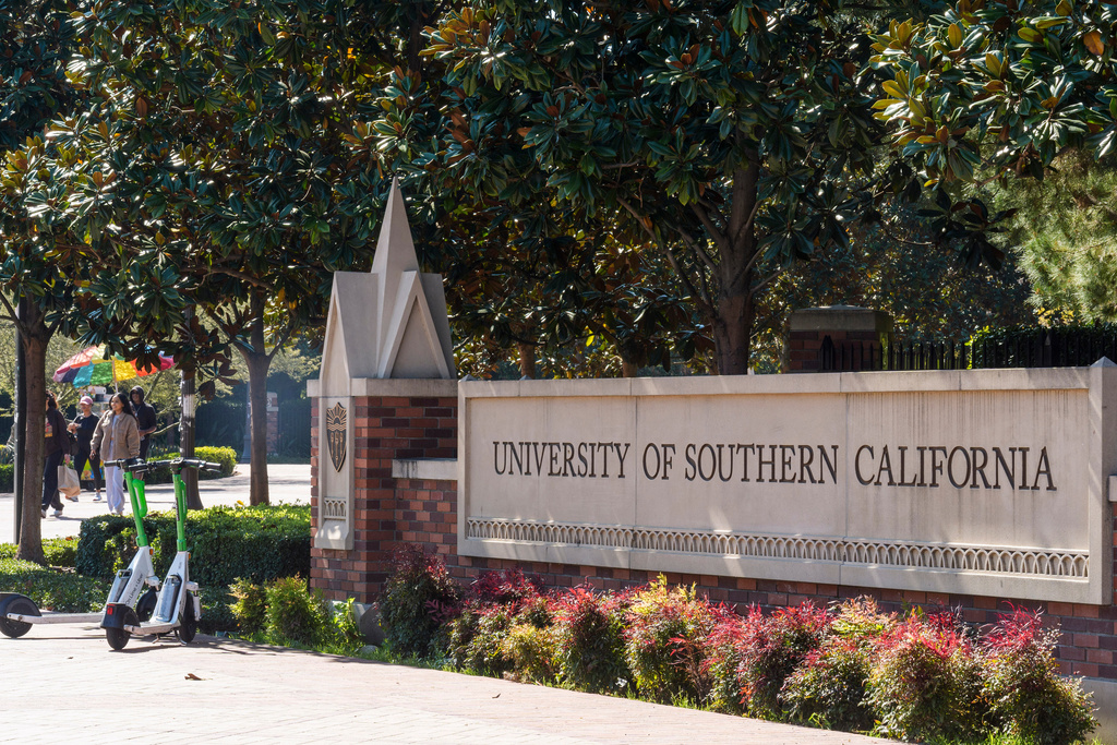 FILE - A sign for the University of Southern California is displayed at a campus entrance in Los Angeles, April 16, 2024. (AP Photo/Damian Dovarganes, File)
