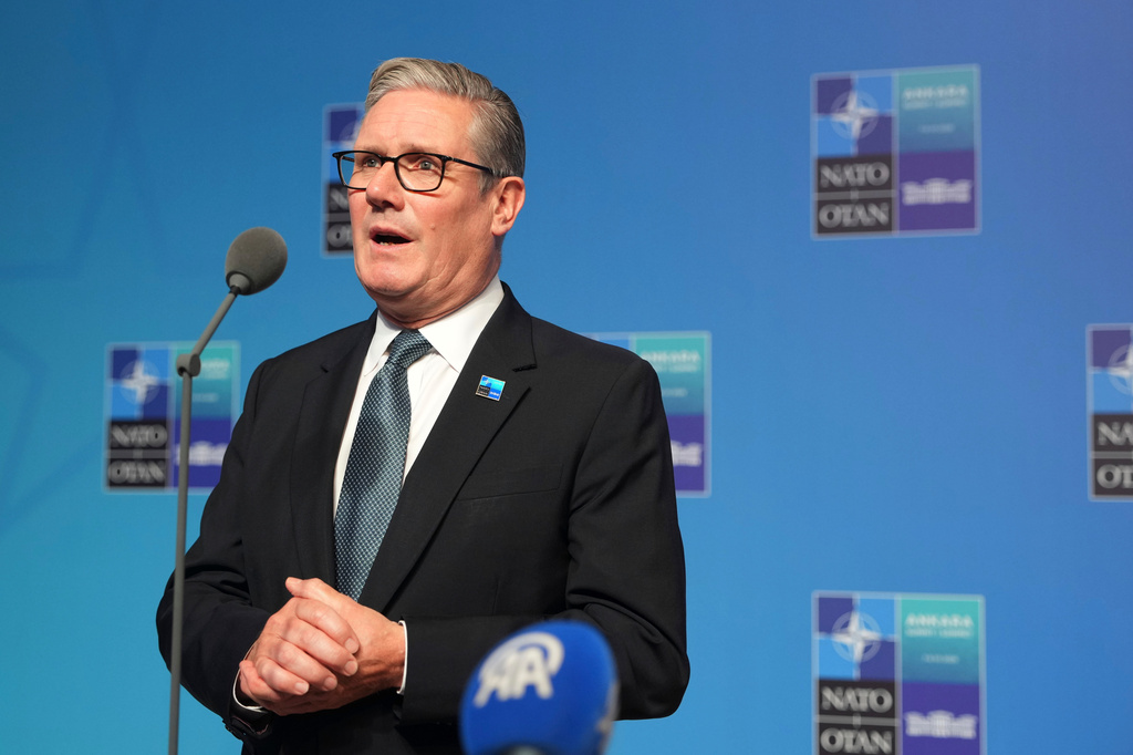 Britain's Prime Minister Keir Starmer speaks to reporters upon arrival for the NATO summit in Ankara, Turkey, Wednesday, July 8, 2026. (AP Photo/Alastair Grant, Pool)