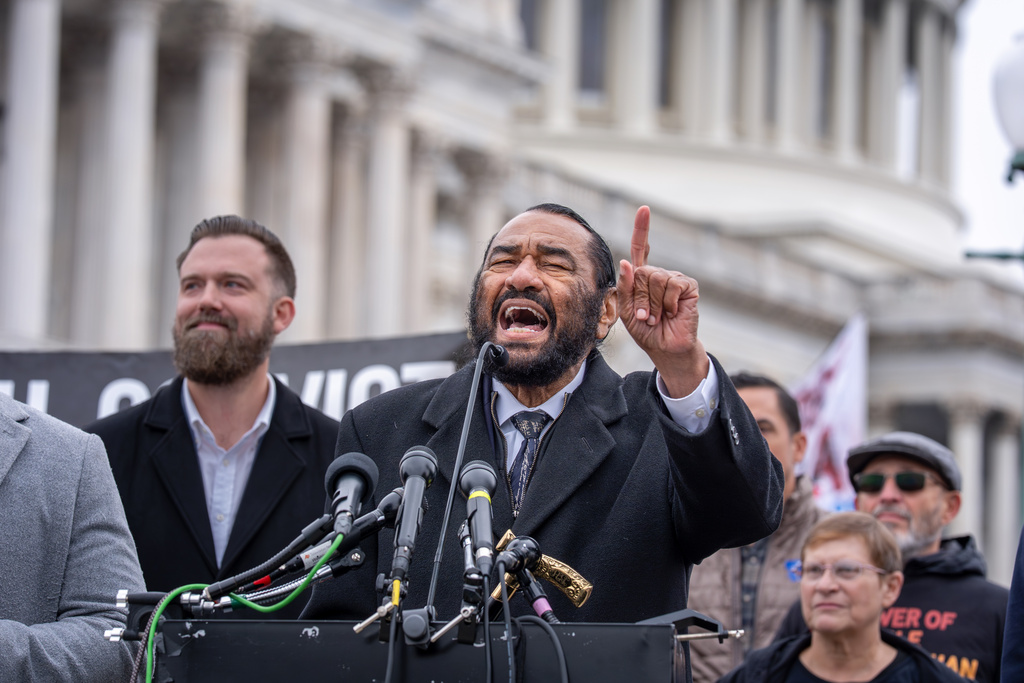 Rep. Al Green, D-Texas, joins activists demonstrating against the policies and conduct of President Donald Trump where he hints the possibility of bringing articles of impeachment against as he did in 2017, at the Capitol in Washington, Thursday, Nov. 20, 2025. (AP Photo/J. Scott Applewhite)