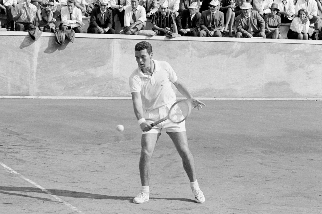 FILE - Italy's Nicola Pietrangeli in action during his Davis Cup singles tennis match against United States' Jon Douglas, in Rome, Oct. 16, 1961. (AP Photo/Mario Torrisi, File)