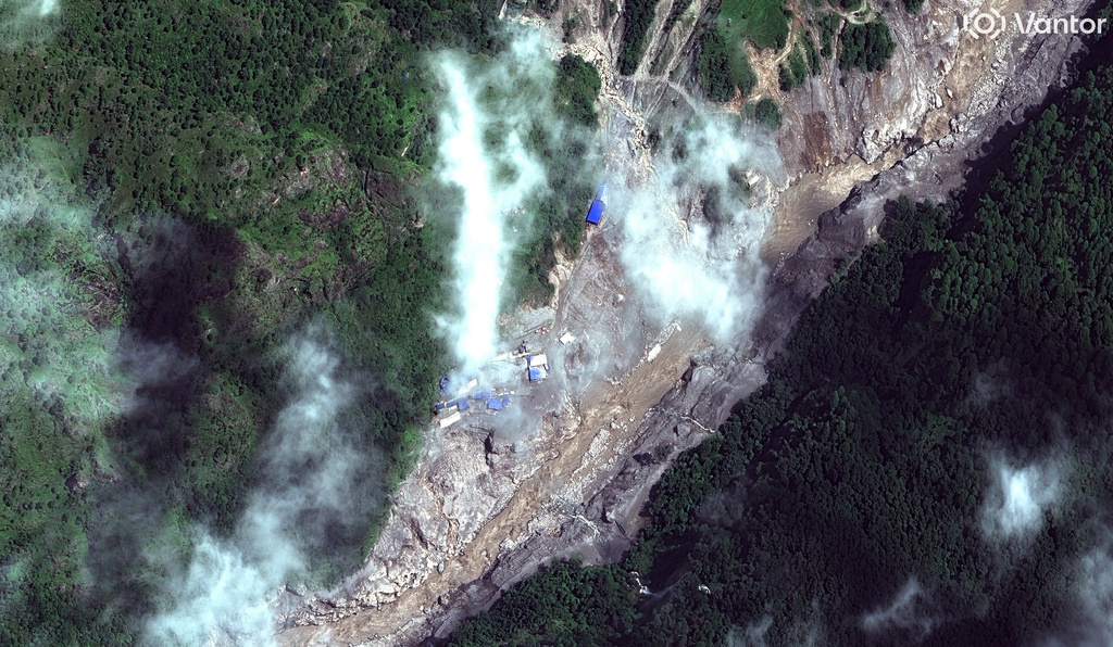 This satellite image provided by Vantor shows the remains of a cement site in Nepal on Thursday, Aug. 27, 2026. (Satellite image ©2026 Vantor via AP)