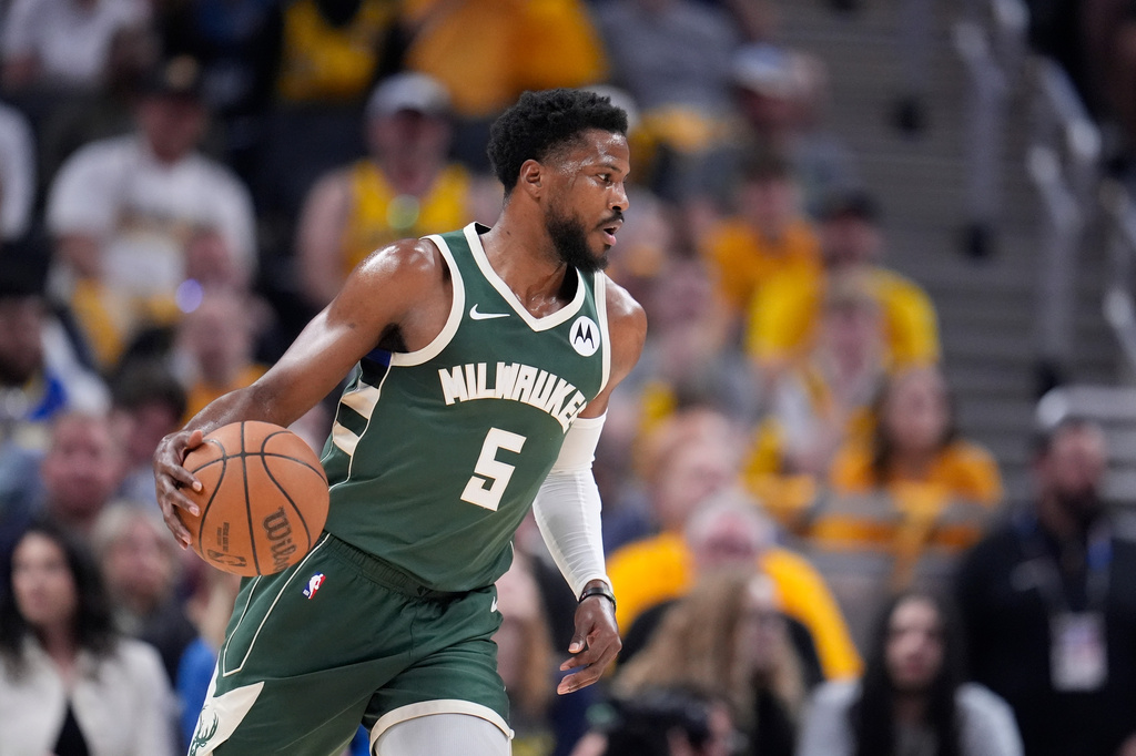 FILE - Milwaukee Bucks' Malik Beasley dribbles during the first half of Game 4 of the first round NBA playoff basketball series against the Indiana Pacers, April 28, 2024, in Indianapolis. (AP Photo/Michael Conroy, file)